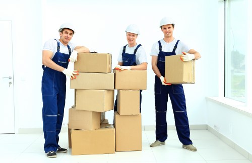 Packed moving boxes and household items ready for collection