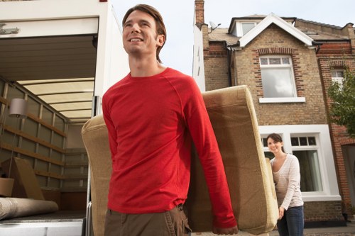 Team coordinating an office move with furniture and IT equipment