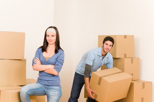 Professional movers supporting a Twickenham relocation with boxes and furniture